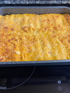 Una foto de Canelones con una bechamel especial