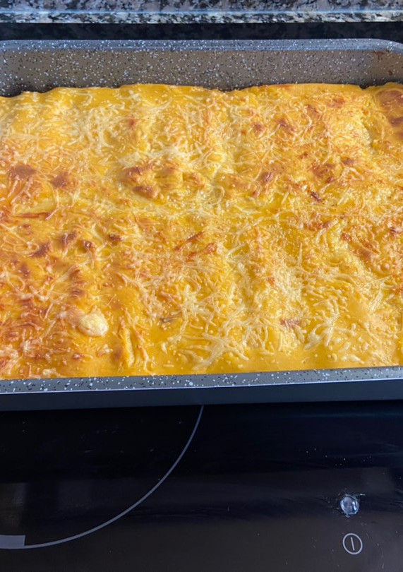 Una foto de Canelones con una bechamel especial
