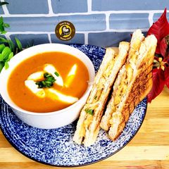A picture of Restaurant Style Classic Tomato Soup and Grilled Cheese Sandwich.