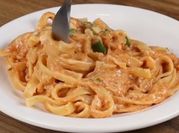 Una foto de fettuccine con champiñon