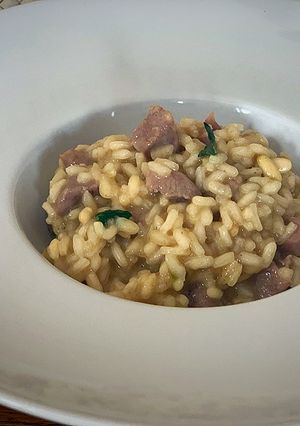 Una foto de Arroz meloso de pavo al vermú