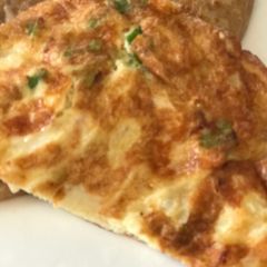 A picture of Chessy green onion omelet.