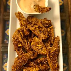 A picture of Spicy-Parmesan Eggplant fingers.