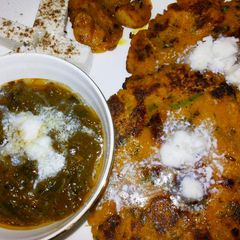 Makki ka parantha with sarso ka saag A picture of Makki ka parantha with sarso ka saag.