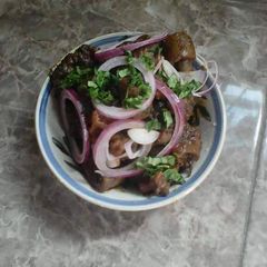 A picture of Pomo with utazi leaves.
