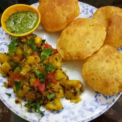 Masala Missi Puri with Aloo Pyaaz Sabji A picture of Masala Missi Puri with Aloo Pyaaz Sabji.