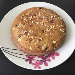A picture of Eggless cashew and walnut cake.