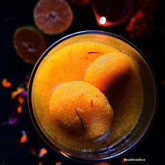 A picture of KOMOLA BHOG /ORANGE RASAGULLA.