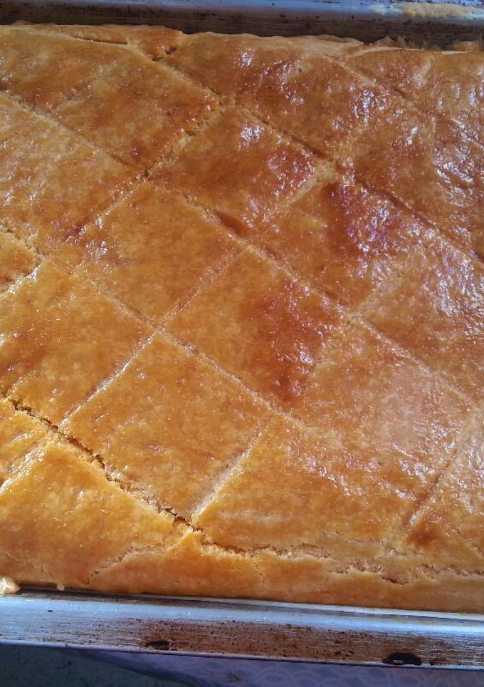 Una foto de Empanada casera de atún y pimientos rojos