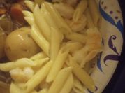 A picture of garlic shrimp and penne