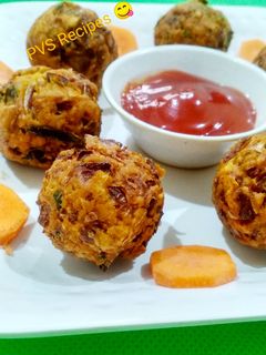 कॅरट पकोडा (carrot pakoda recipe in marathi) रेसिपी चे मुख्य फोटो