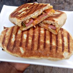 A picture of Grilled chicken panini sandwich.