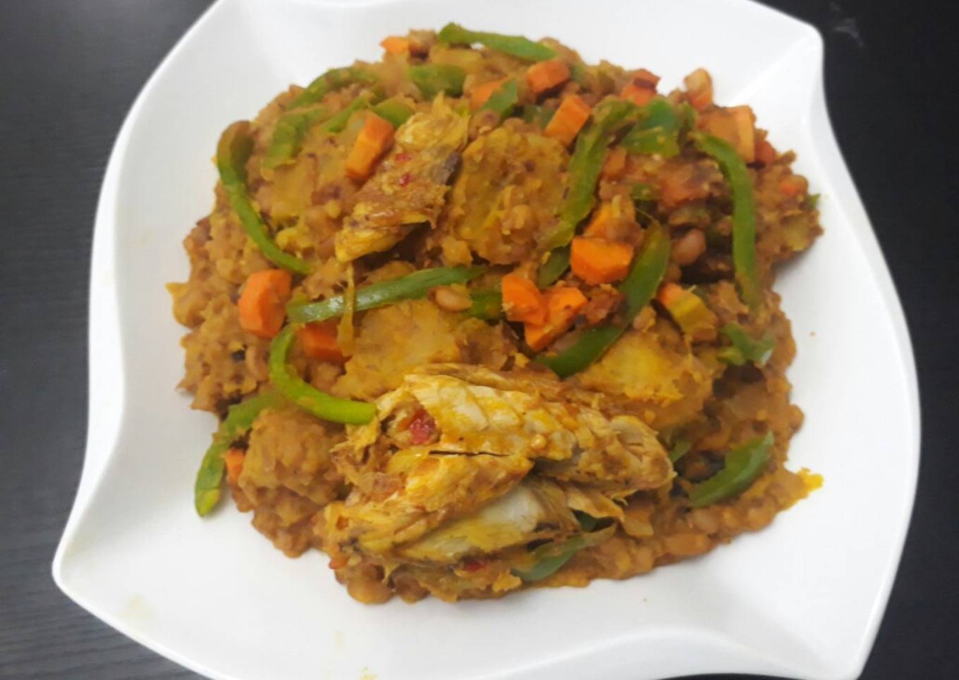 Porriage beans with ripe plantain and titus fish
