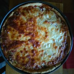A picture of Deep Dish Sausage And Pepperoni Pizza.