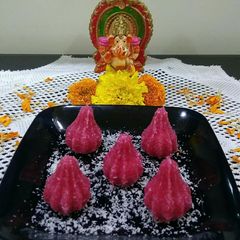 A picture of Creamy Rosy Bread Modak.