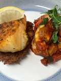 Harissa cod on a rosti served with ratatouille
