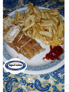 A picture of Chips and egg roll.