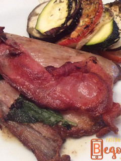 Una foto de "Saltimbocca" de secreto ibérico "sous vide"
