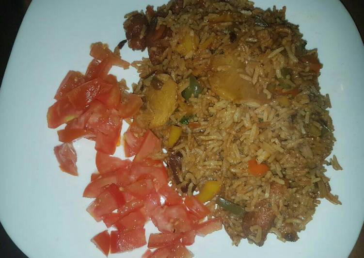 How to Make Perfect Fried rice garnished with tomatoes