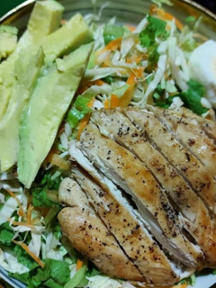 A picture of Chicken, avocado and boiled egg salad.