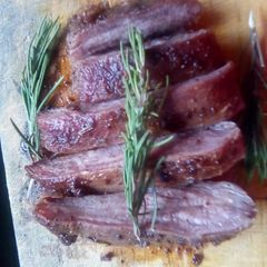 A picture of Pan-Seared Steak with Rosemary and Garlic Butter.