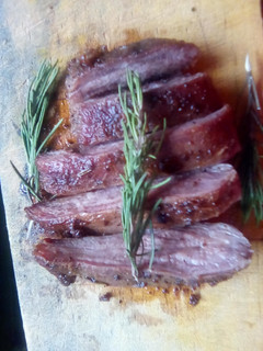 A picture of Pan-Seared Steak with Rosemary and Garlic Butter.