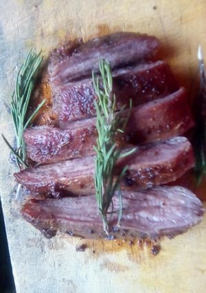 A picture of Pan-Seared Steak with Rosemary and Garlic Butter.