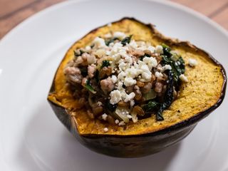 Roasted Acorn Squash with Sausage, Farro, Spinach, and Feta