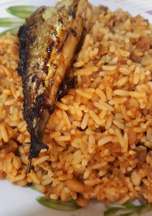 A picture of Rice and beans with titus fish.