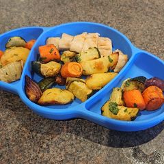 A picture of Lemon and Herb Roast chicken and Vegetables.