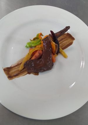 Una foto de Conejo en salsa de chocolate