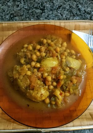 Una foto de Pescado con garbanzos