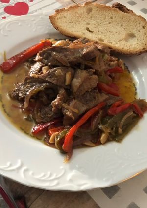 Una foto de Filete de pobre en wok de verduras