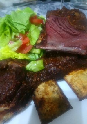 Una foto de Tira de asado al whisky