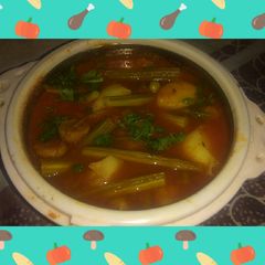 Drumsticks vadi and peas aaloo in tomato gravy A picture of Drumsticks vadi and peas aaloo in tomato gravy.