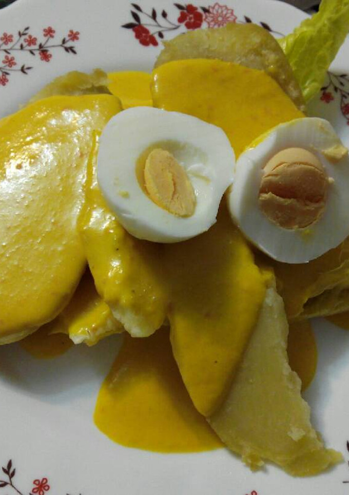 Una foto de Ensalada de rúcula con papa a la huancaína