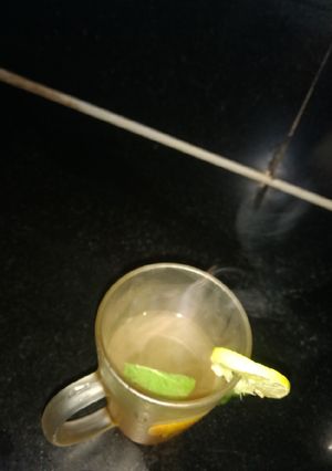 A picture of Green tea with herbs.