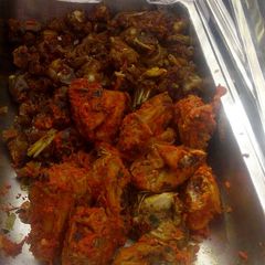 Chicken periperi and sauced goat meat A picture of Chicken periperi and sauced goat meat.