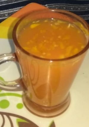 A picture of Orange carrot juice with haldi, ginger.