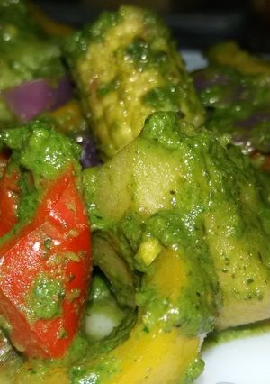A picture of Veg platter in green masala.