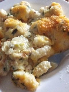 Una foto de Ñoquis rellenos de Queso gratinados con salsa de verdeo 😍