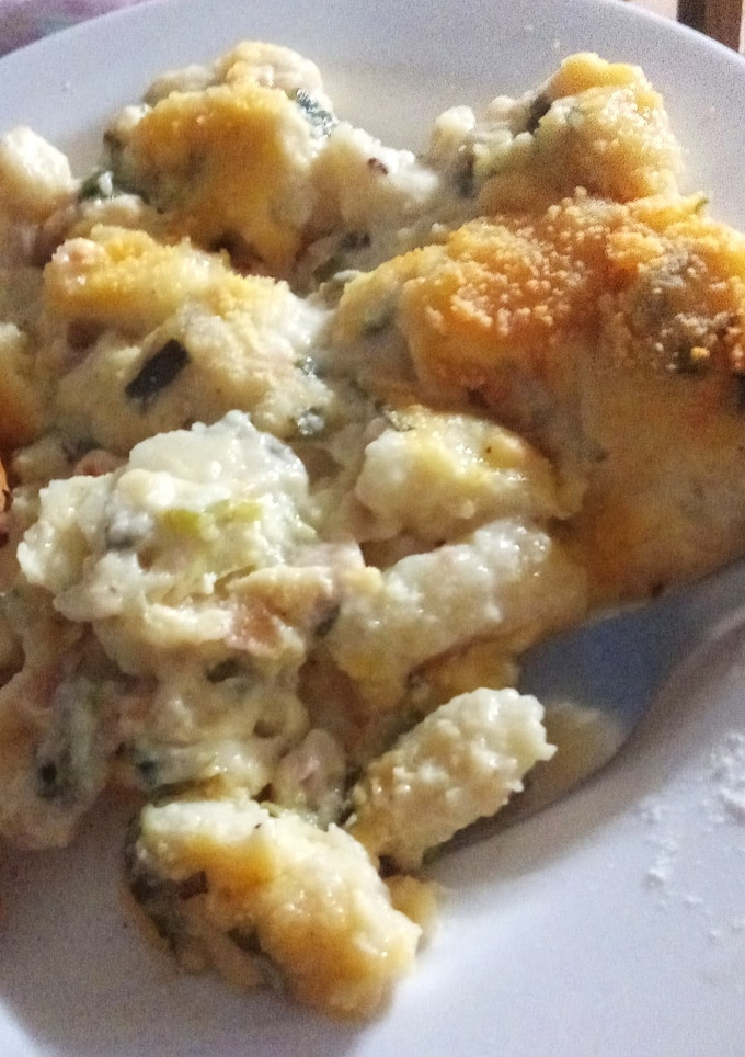 Una foto de Ñoquis rellenos de Queso gratinados con salsa de verdeo 😍