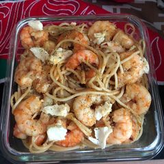 A picture of Garlic shrimp with pasta.