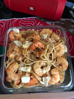 A picture of Garlic shrimp with pasta.