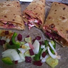 A picture of Paratha chicken veggie roll.