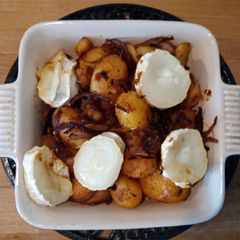 A picture of Sundried-Tomato Pesto- Roasted Potatoes with Goat's Cheese.
