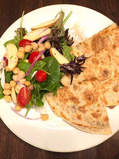 A picture of Chickpeas Lemon Peppers Salad with Refried Bean Veggies Quesadilla.