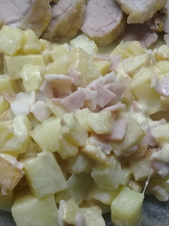Una foto de Papas con crema y panceta