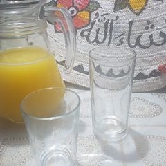 A picture of Pineapple and orange juice.