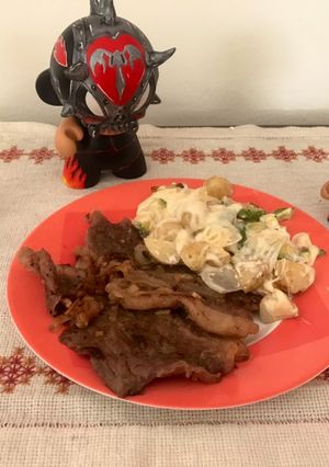 Una foto de Carne con papas “Candado brazo”